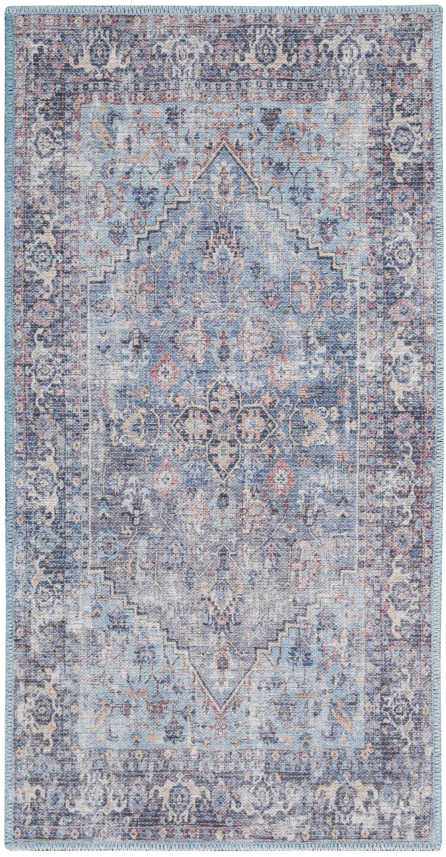 Blue-toned vintage oriental rug with central medallion, intricate floral border, distressed wash, fringed edges.