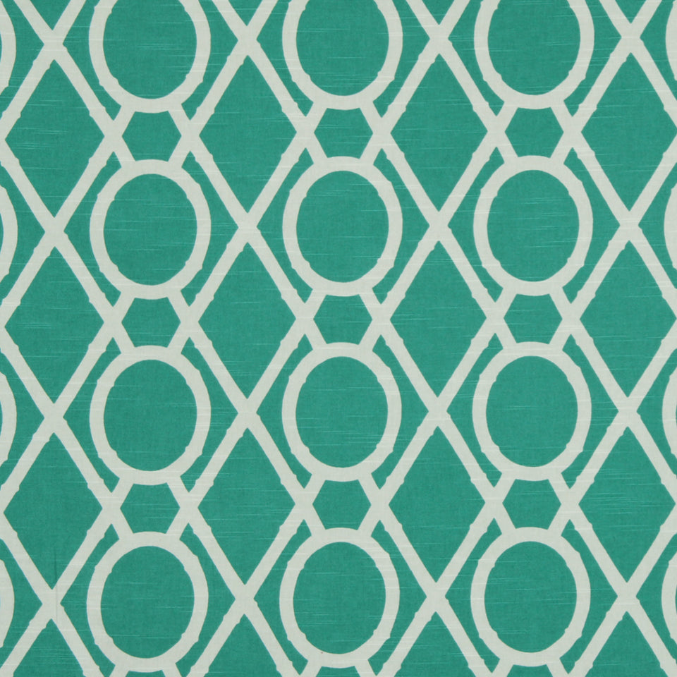 Teal wallpaper with repeating white lattice diamonds and circular motifs; modern geometric pattern.