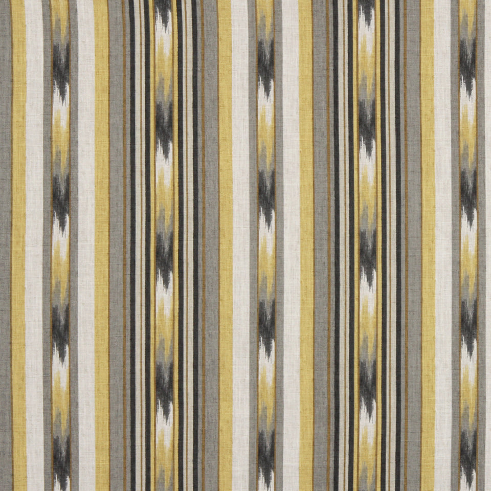 Vertical striped fabric in yellow, gold, gray, black and beige; Ikat-inspired upholstery or drapery textile.