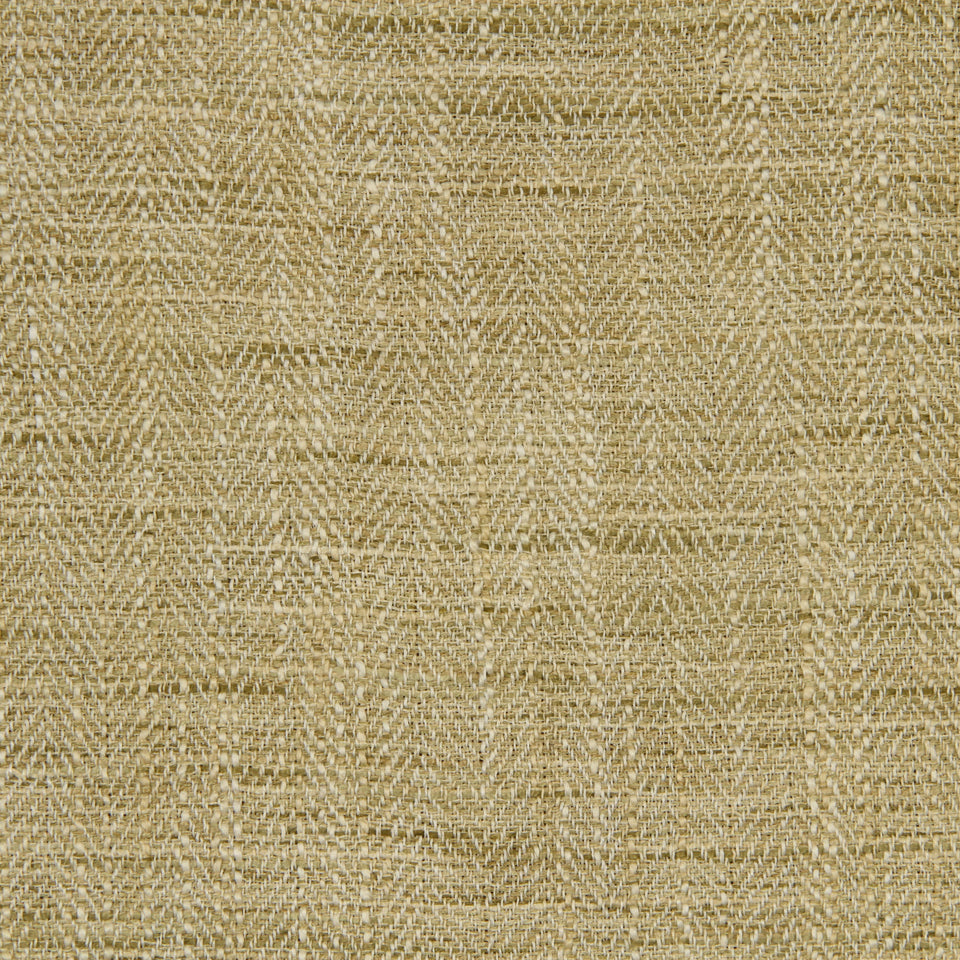 Golden beige woven textile with chevron zigzag pattern and textured natural fiber look.