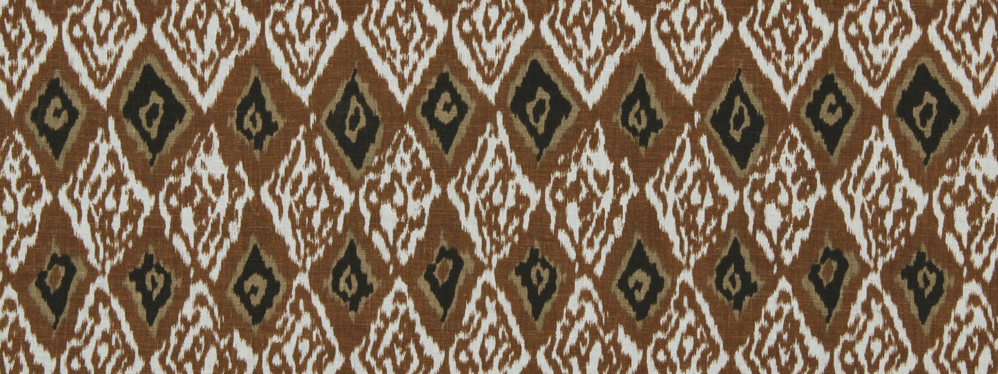 Brown, tan, white and black diamond ikat pattern textile with repeating geometric diamonds.