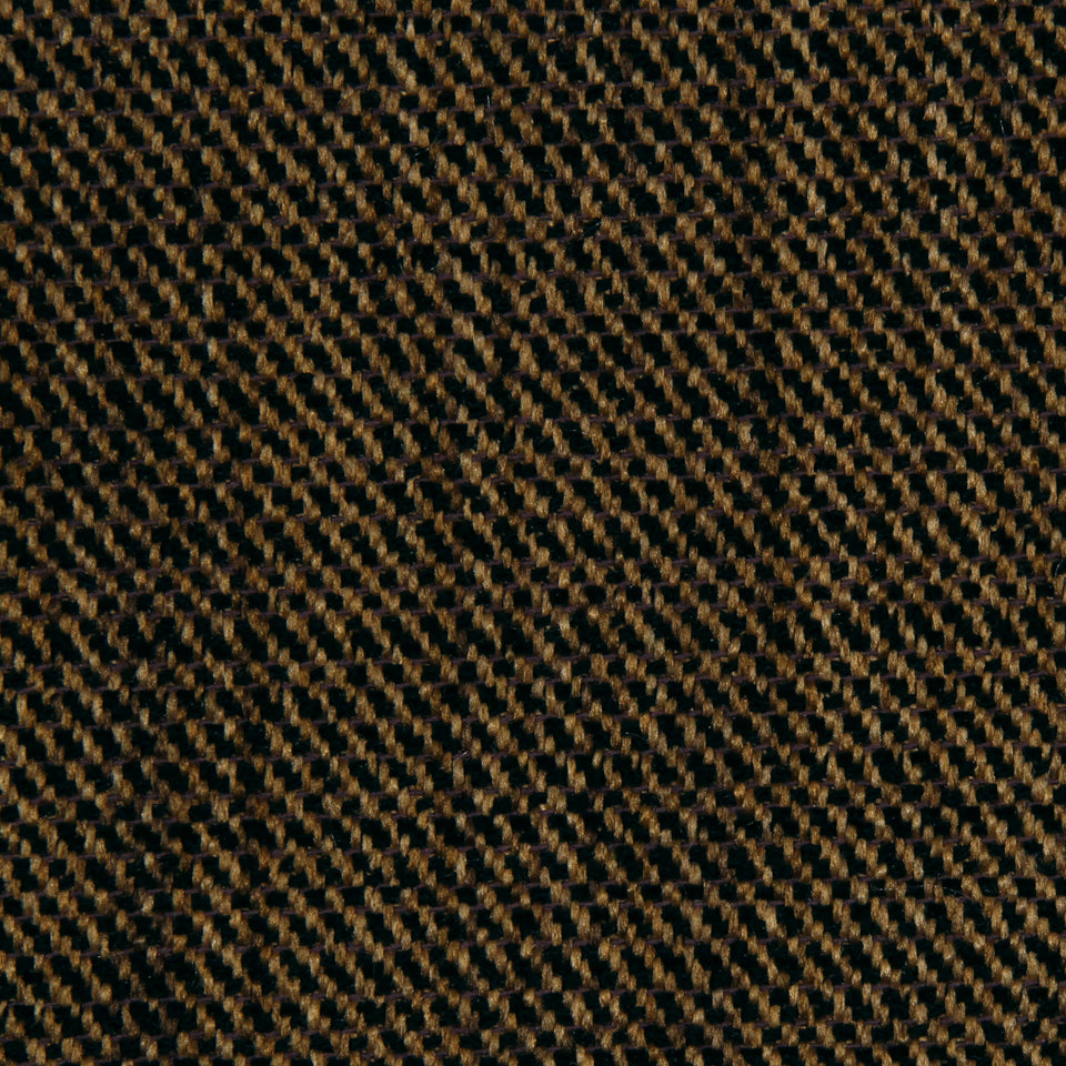 Tan and black houndstooth upholstery fabric with a tweed-like texture.
