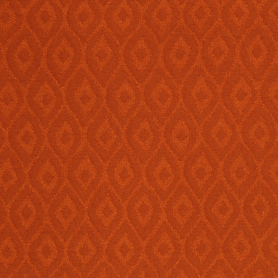 Rust-orange jacquard fabric with a repeating diamond damask pattern.