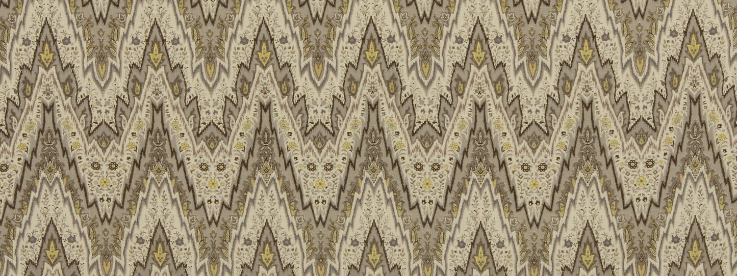 Ikat-inspired zigzag pattern in beige, cream, brown with yellow accents; ideal for upholstery or wallpaper.