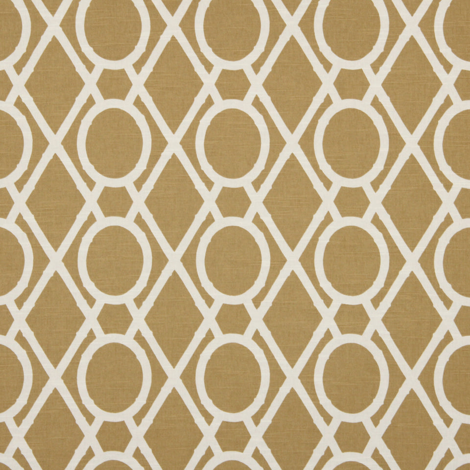 Mustard-yellow upholstery fabric with white interlocking diamond lattice & oval circles; bold geometric pattern.