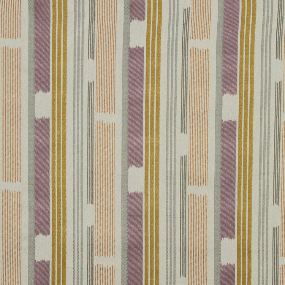 Vertical striped upholstery fabric in mustard yellow, lavender, peach and gray on ivory background; geometric mid-century style.