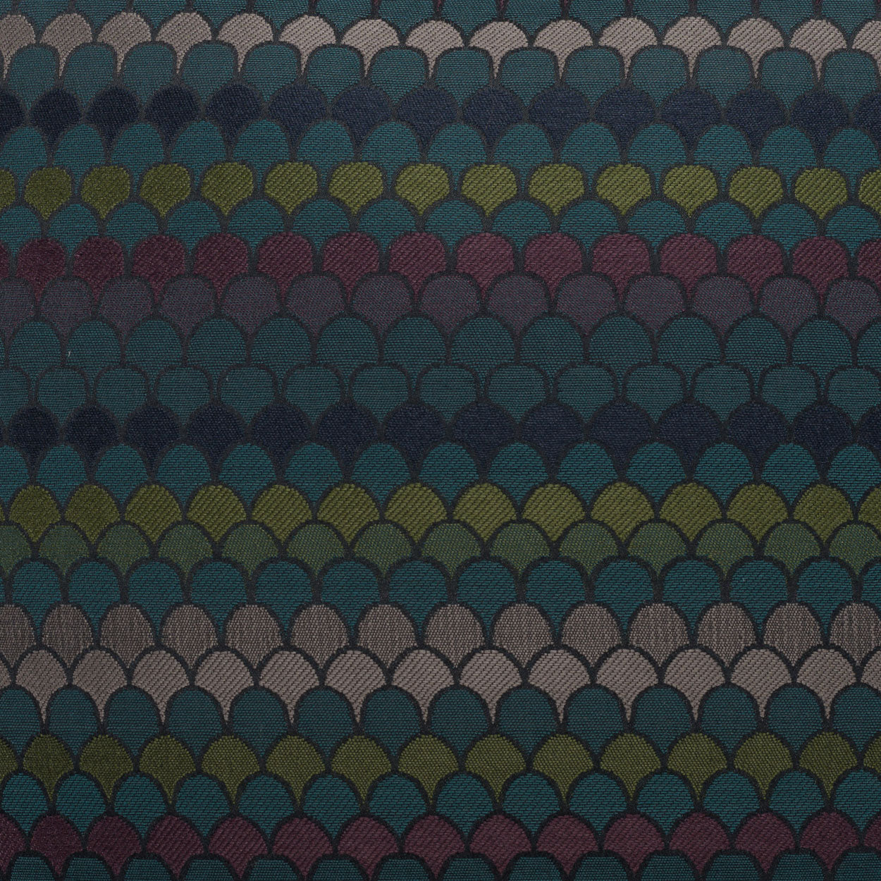 Mermaid-scale patterned fabric with overlapping semicircles in teal, navy, olive, maroon and mauve.