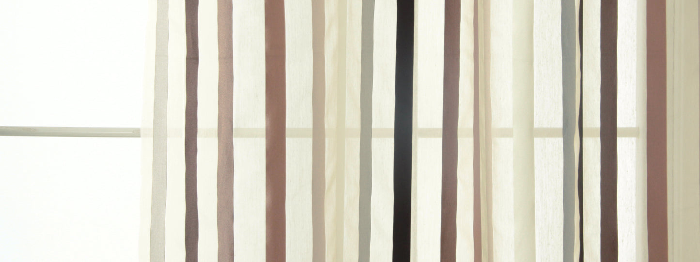 Sheer vertical striped curtains in beige, tan and cream tones, light-filtering window decor.