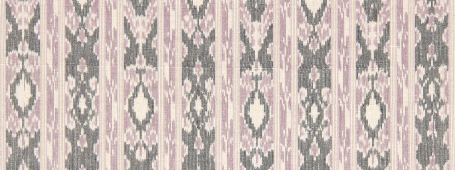 Ikat-inspired fabric in pink, gray and cream with vertical diamond motifs; decorative textile for drapes or cushions.