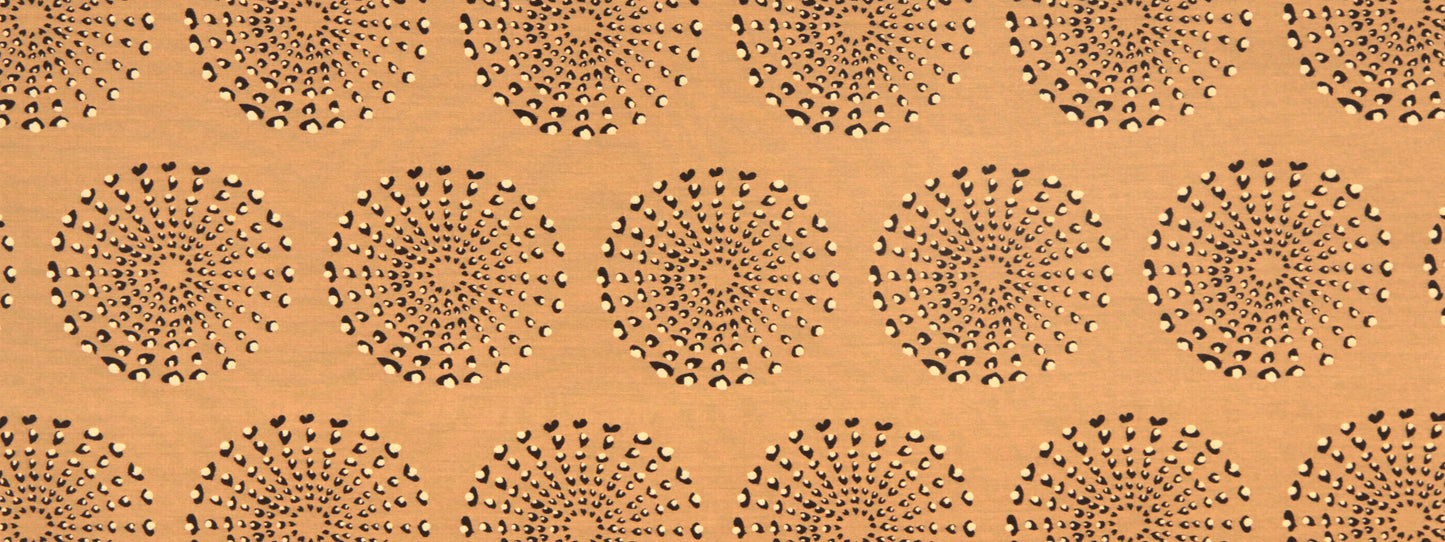Orange background with repeating black sunburst dotted circles; retro geometric pattern.