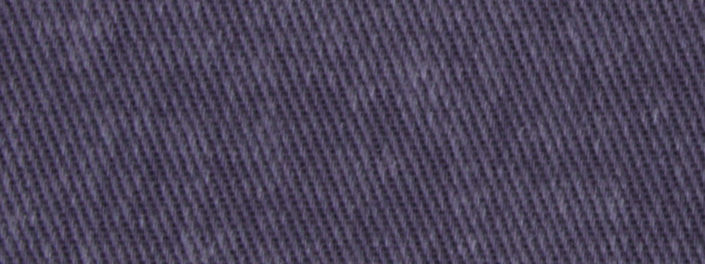 Close-up of cobalt upholstery fabric with diagonal twill texture.