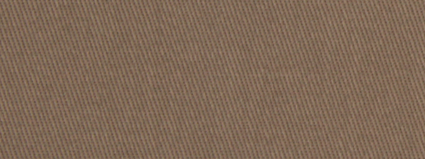 Close-up of warm brown cotton twill upholstery fabric with diagonal weave texture.