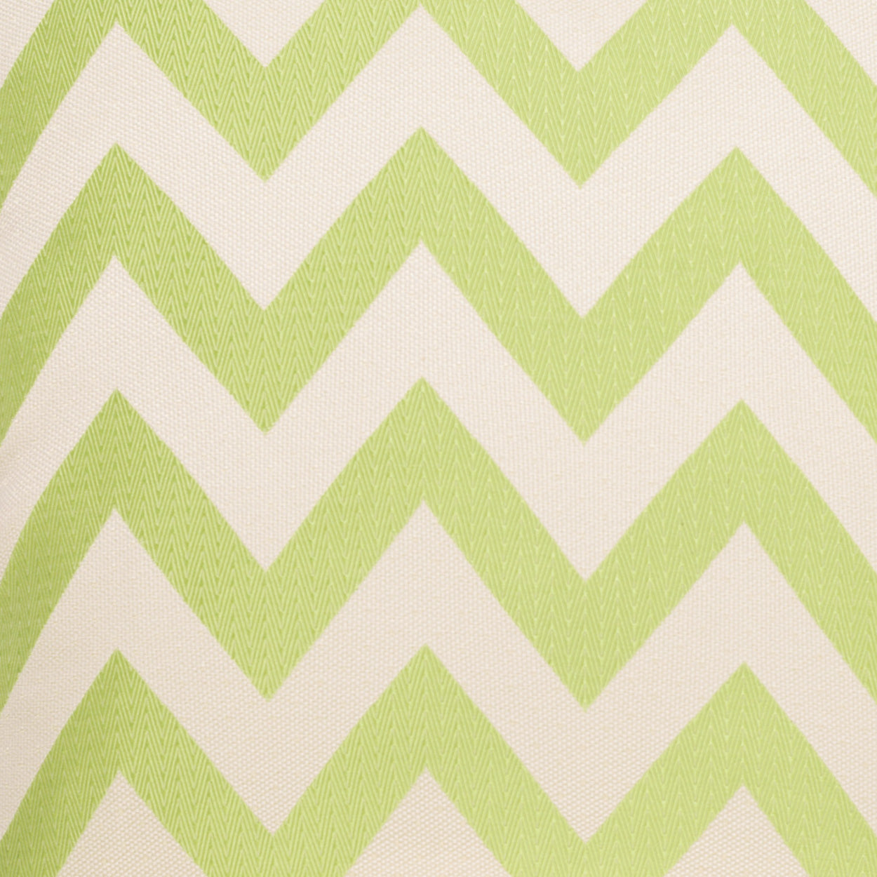 Lime green chevron zigzag pattern on cream textured fabric; modern, versatile upholstery or cushion textile.