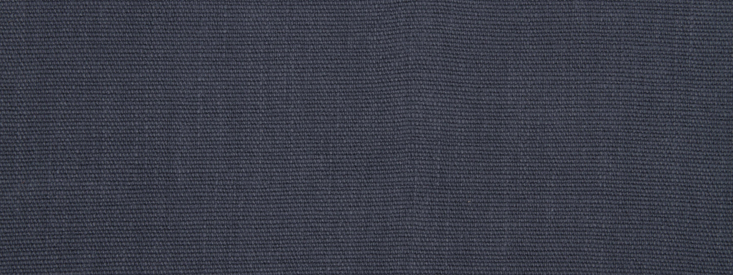 Close-up of dark navy blue woven fabric texture with visible fibers.