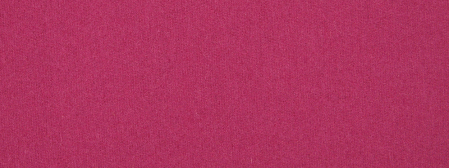 Close-up magenta fabric texture with visible fibers.
