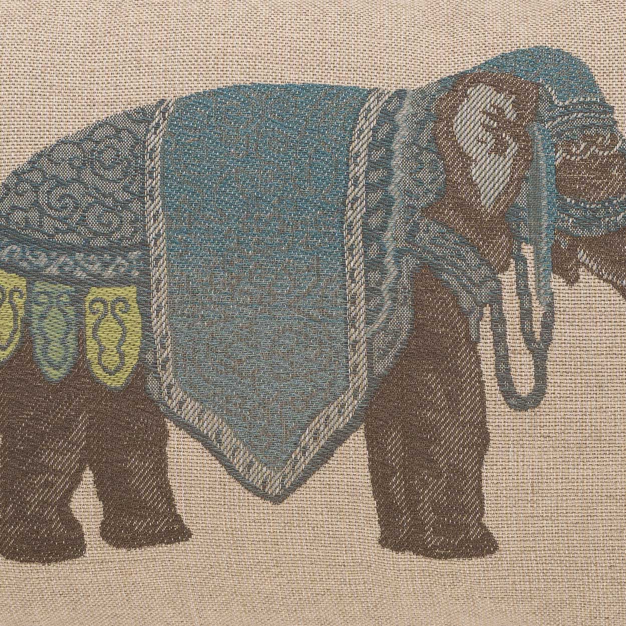 Woven lumbar pillow featuring a brown elephant with a blue saddle-blanket motif and ornate trim.