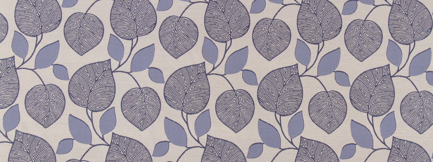 Botanical leaf-pattern upholstery fabric with lavender and bluish leaves on beige background; repeating vine motif.