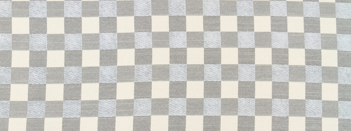 Beige and pale blue-gray checkerboard upholstery fabric with a square pattern.