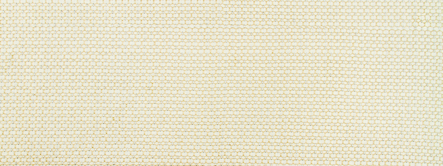 Cream fabric with tiny yellow dotted grid pattern; lightweight woven textile.
