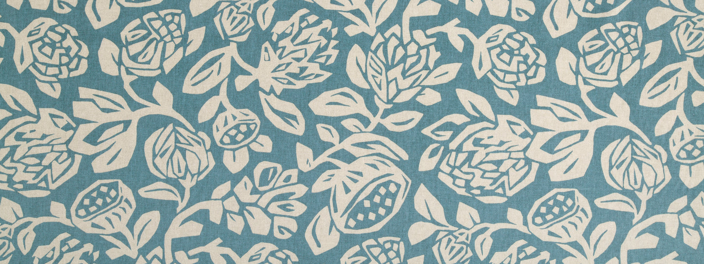 Teal background with cream rose-and-leaf floral pattern; vintage botanical motif for textiles or wallpaper.