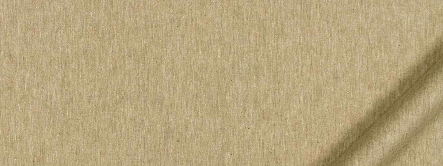 Beige textured fabric close-up with woven grain and subtle diagonal shadows.
