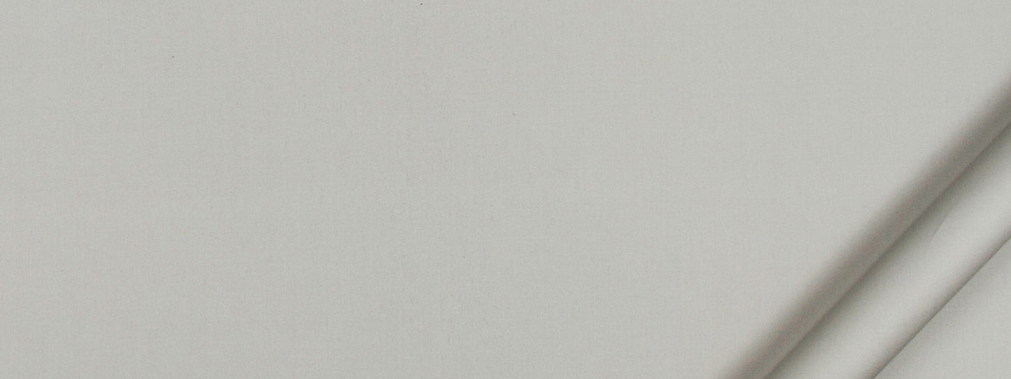 Soft gray fabric swatch with a subtle diagonal fold along the right edge.