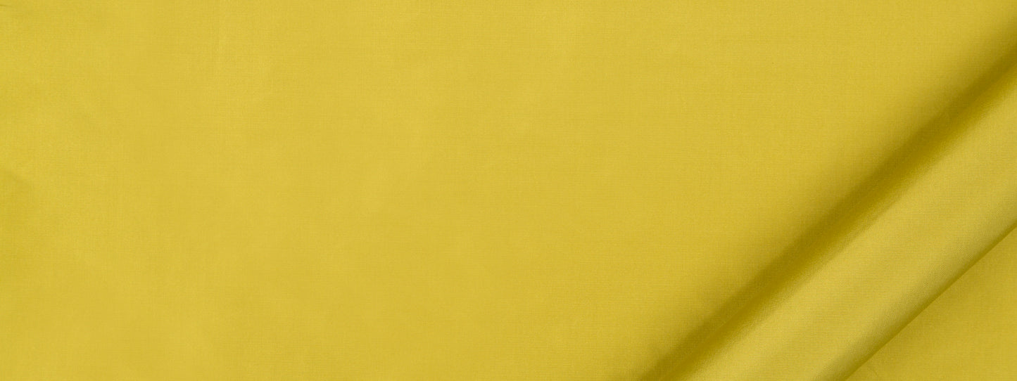 Bright yellow fabric close-up with subtle vertical stripes and a diagonal fold.