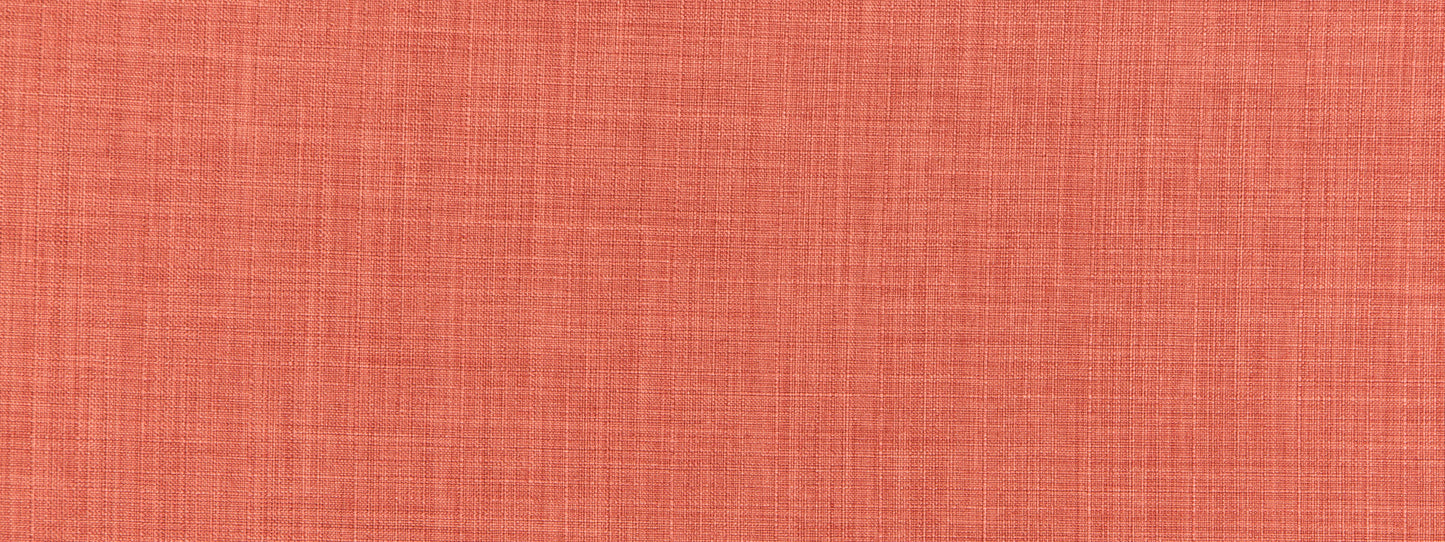 Peach-orange textured woven fabric close-up.