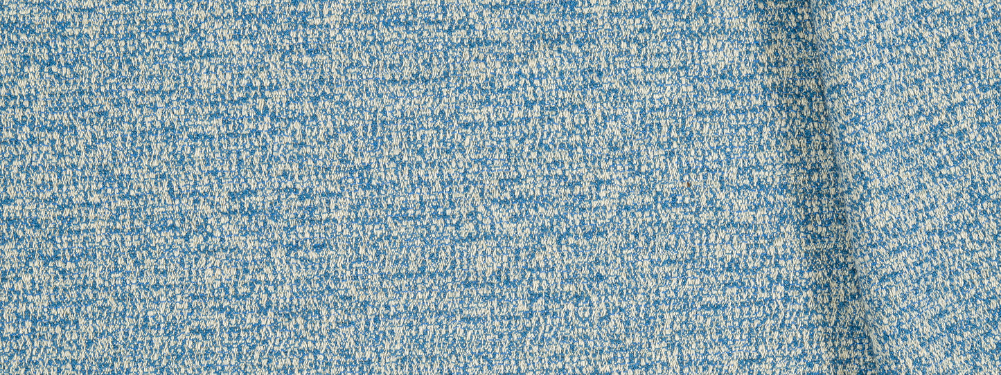 Blue heather upholstery fabric with white flecks and a soft tweed-like texture.