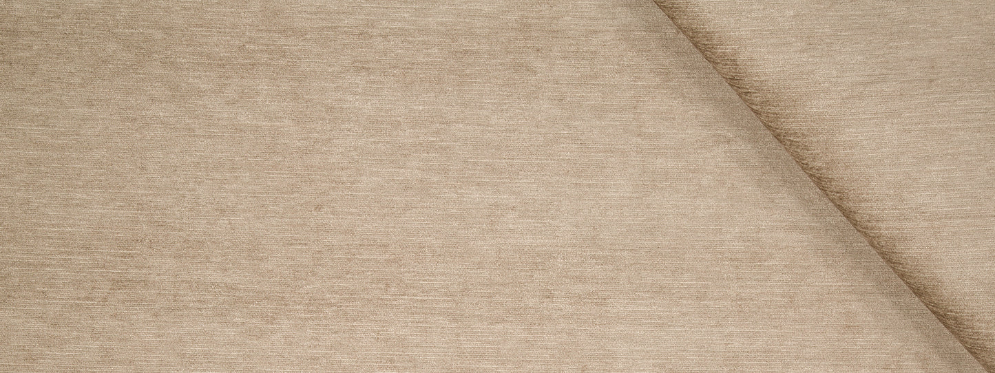 Beige woven fabric texture with diagonal crease; warm tan upholstery or drapery fabric.