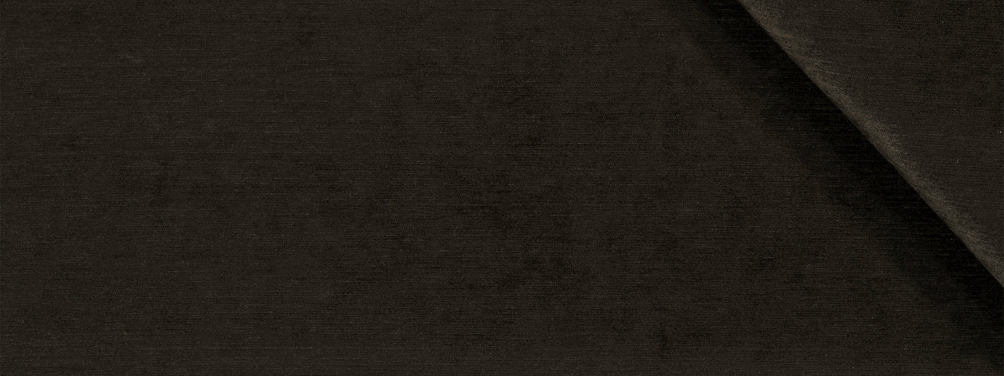 Dark brown fabric close-up with subtle texture and diagonal fold.