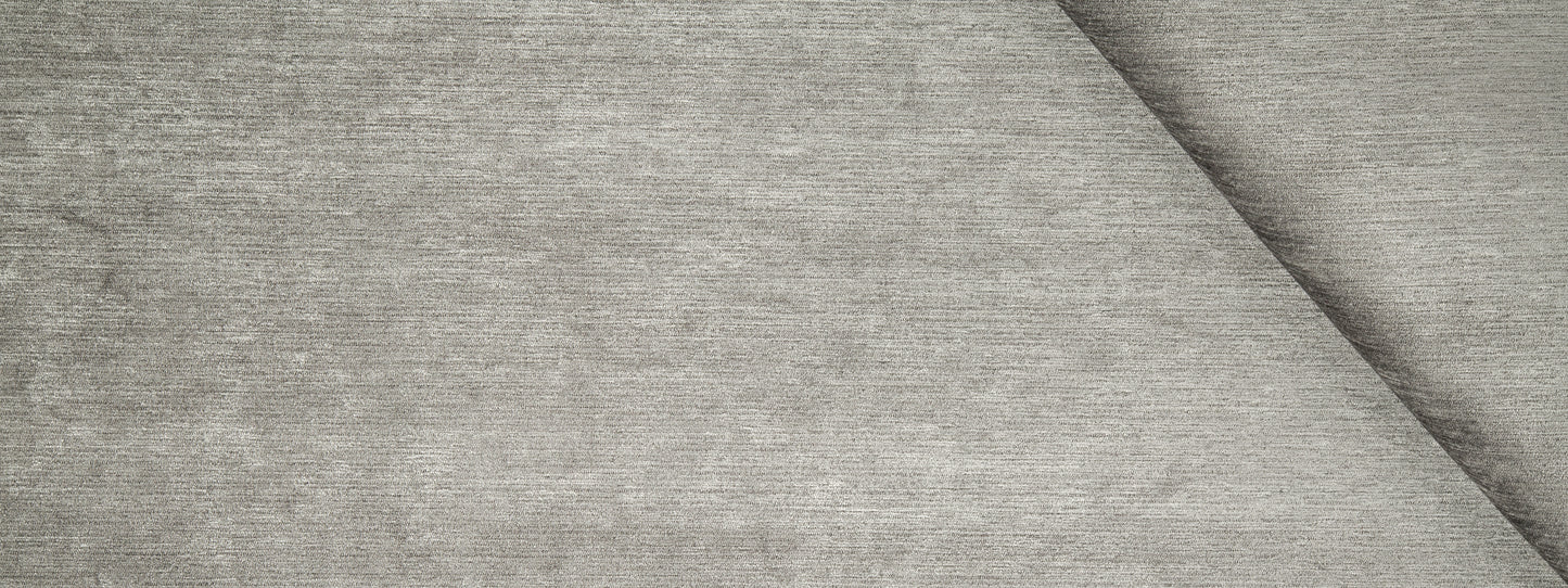 Charcoal chenille upholstery fabric with a soft, heathered texture and a diagonal fold.