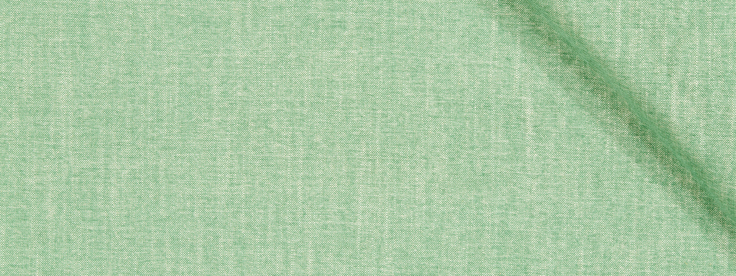 Mint green chenille upholstery fabric close-up with woven texture and subtle diagonal shadow.