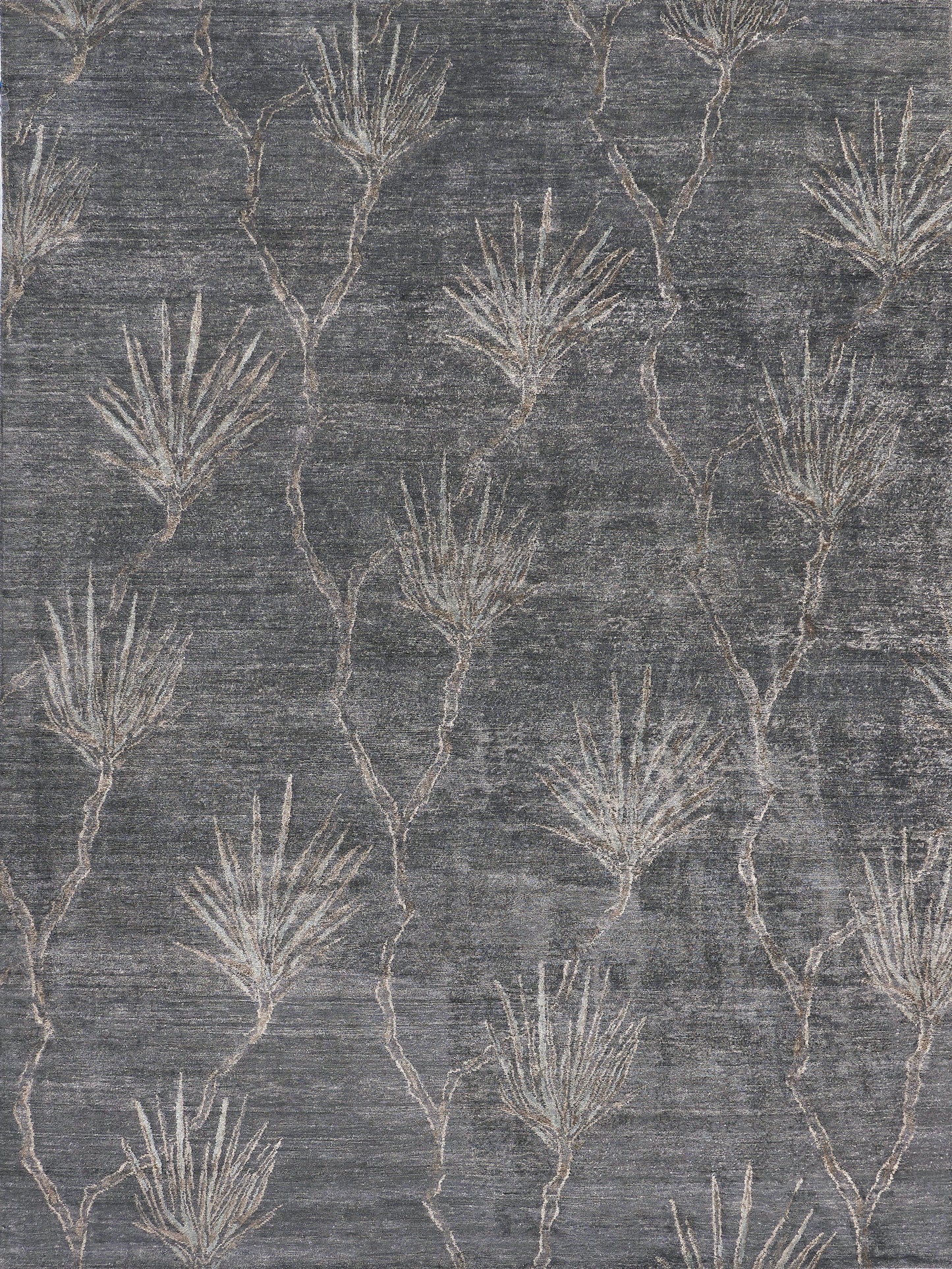 Gray area rug with linear plant motifs in light beige, featuring a soft texture and modern botanical style.
