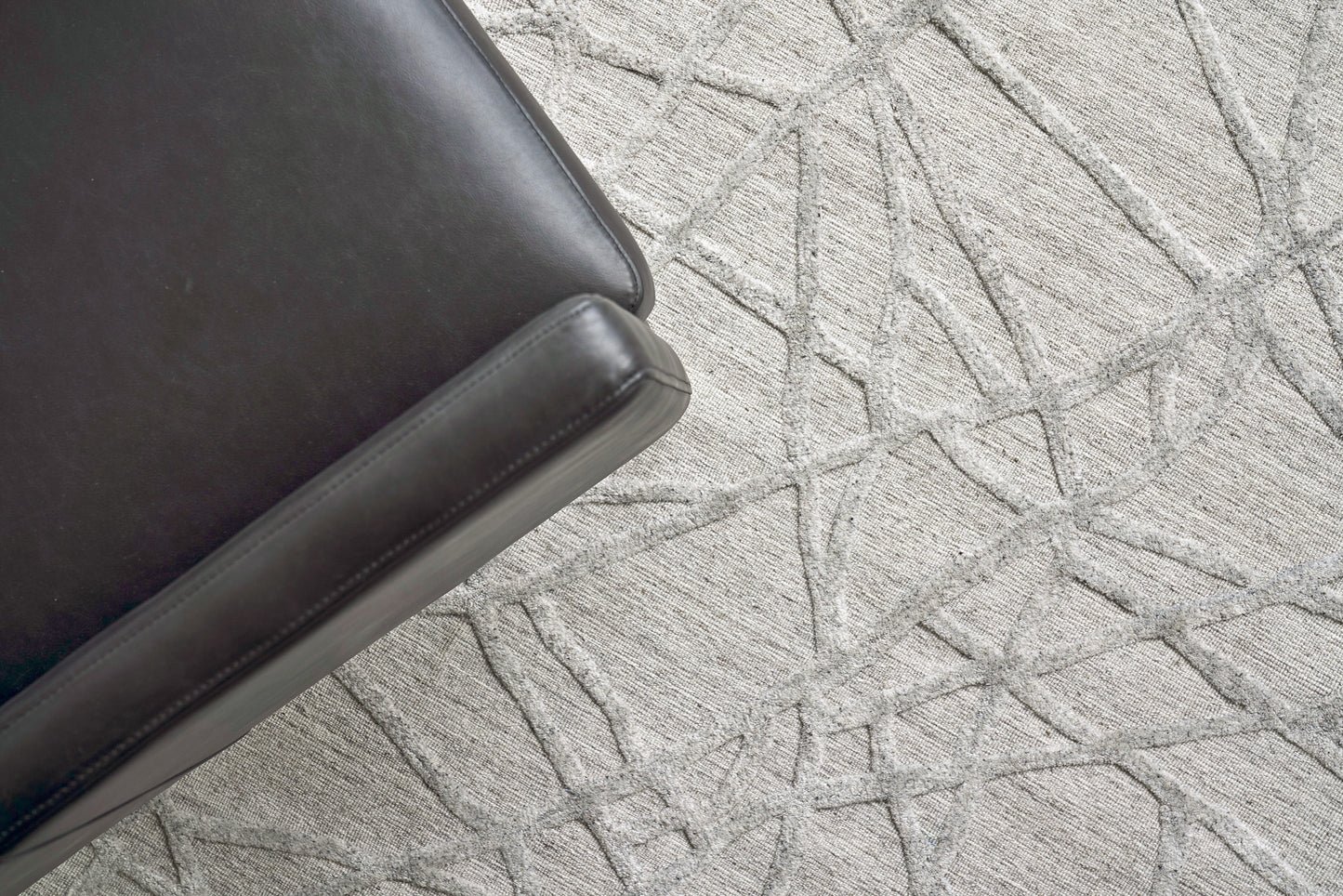 Close-up of a textured, hand-loomed rug surface; 6' x 9' rug.