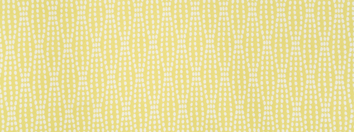 Soft yellow woven fabric with white geometric dotted pattern; light texture, great for drapes or cushions.