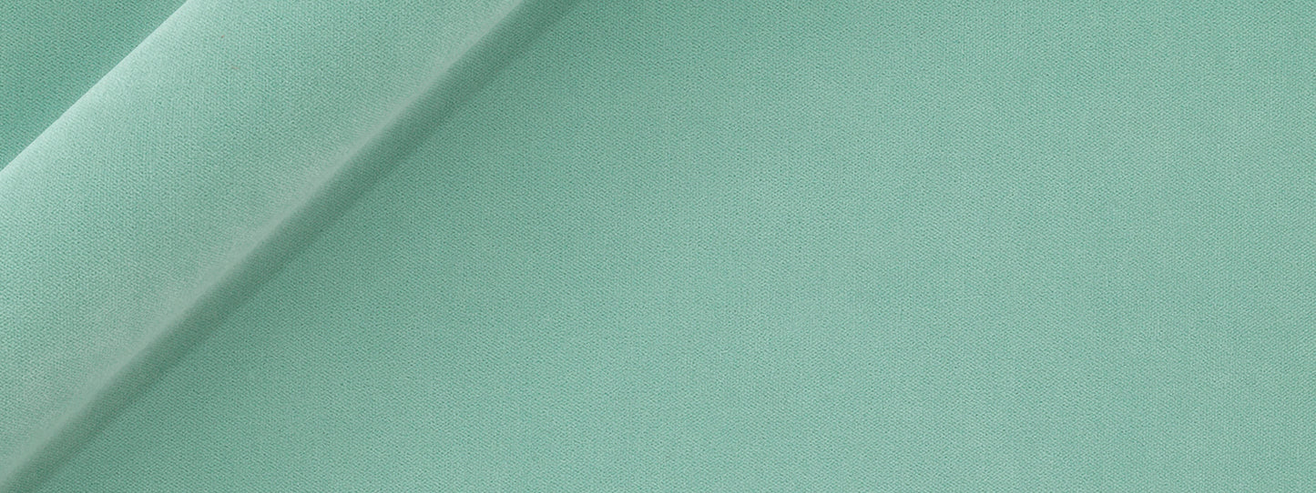 Robin's egg velvet upholstery fabric swatch with a diagonal seam and overlapping edges.