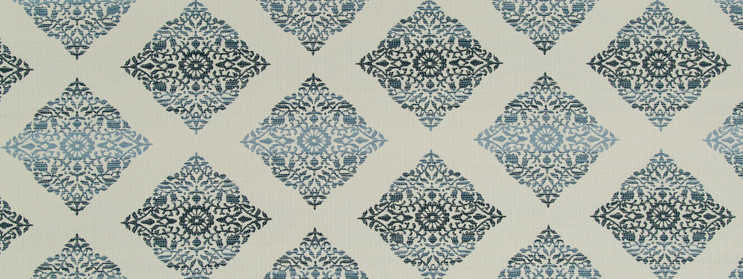 Blue damask diamond pattern with rosette floral motifs on beige background.