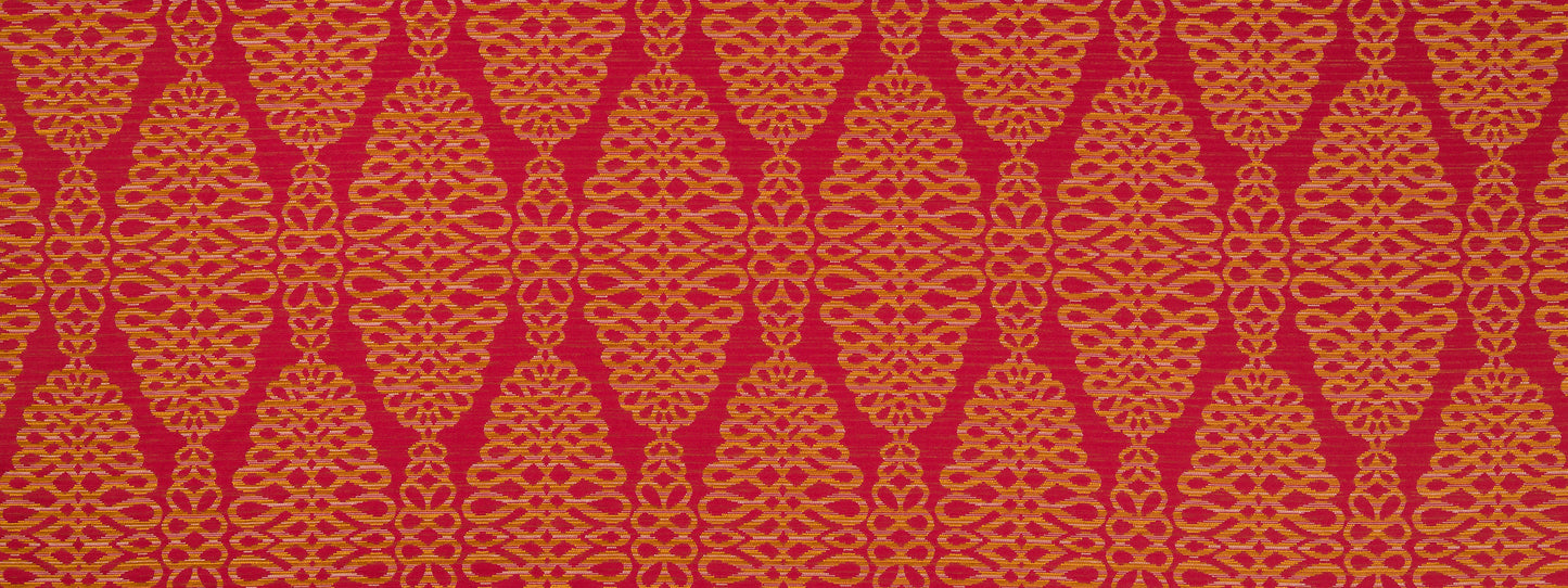 Red fabric with a gold ornate damask lattice pattern; decorative textile for upholstery or fashion.