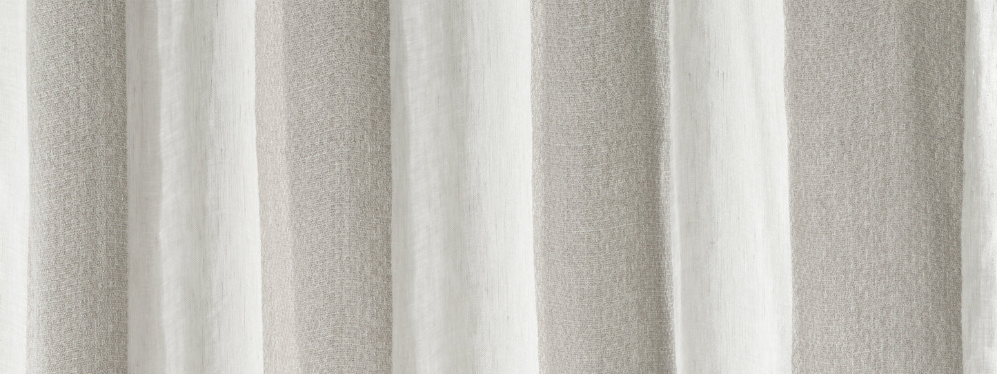 White linen-textured curtain fabric with vertical folds and soft drape, home decor curtain panel.