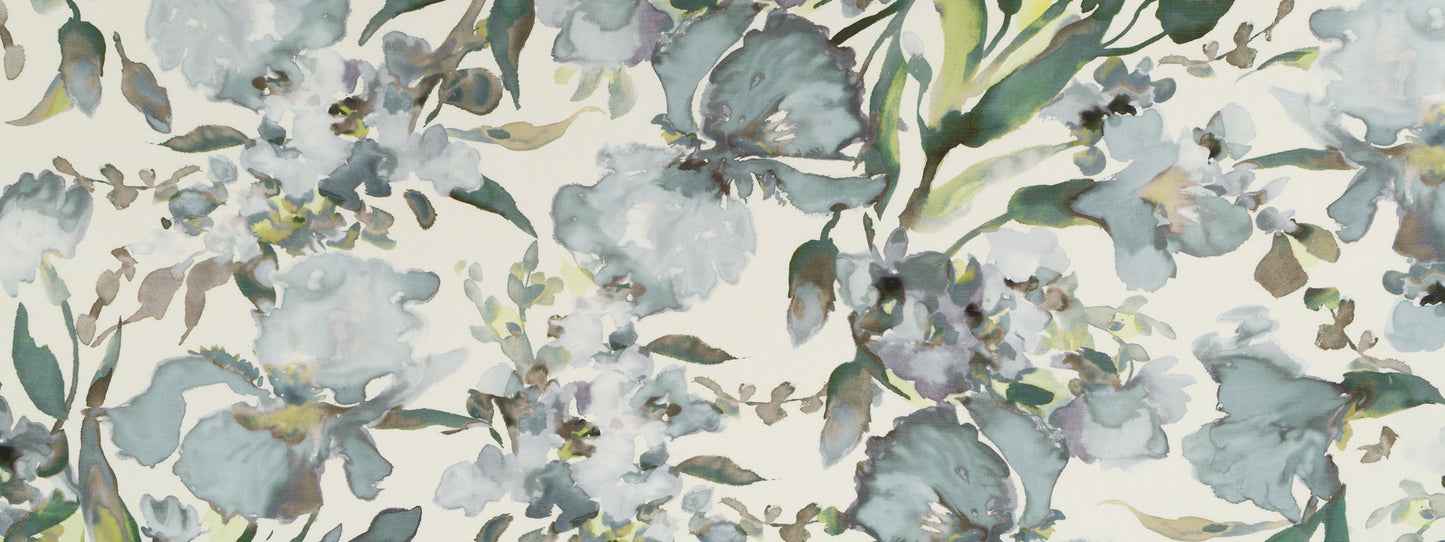 Watercolor floral print with blue-gray blossoms and green stems on a light background.