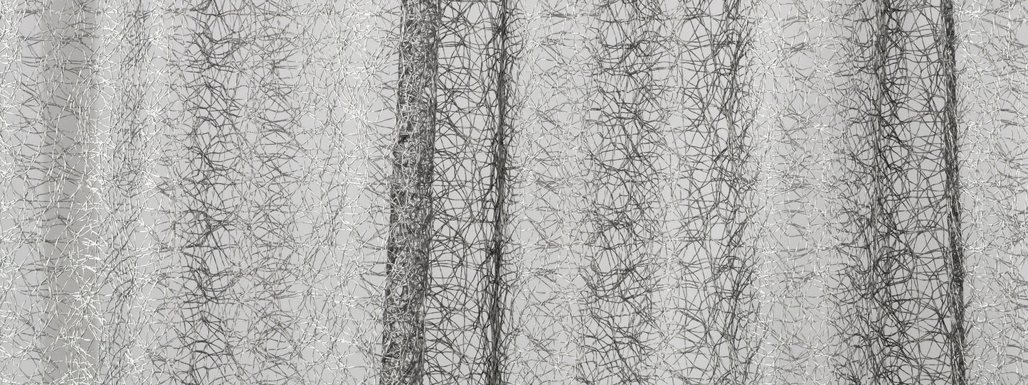 Silver metallic sheer curtain fabric with crinkled texture and vertical folds, adds modern shimmer to windows.
