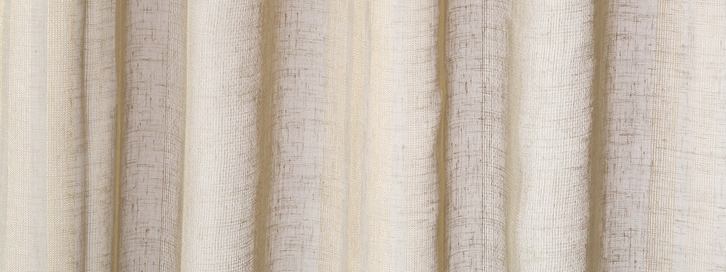 Cream-beige curtains with a textured weave, vertical folds, and the Skip Stripe pattern.