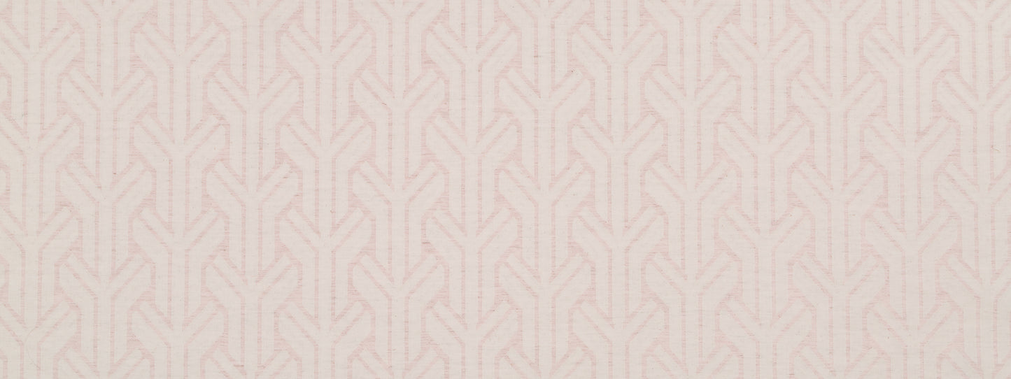 Soft pink upholstery fabric with a repeating pale-beige chevron lattice pattern.