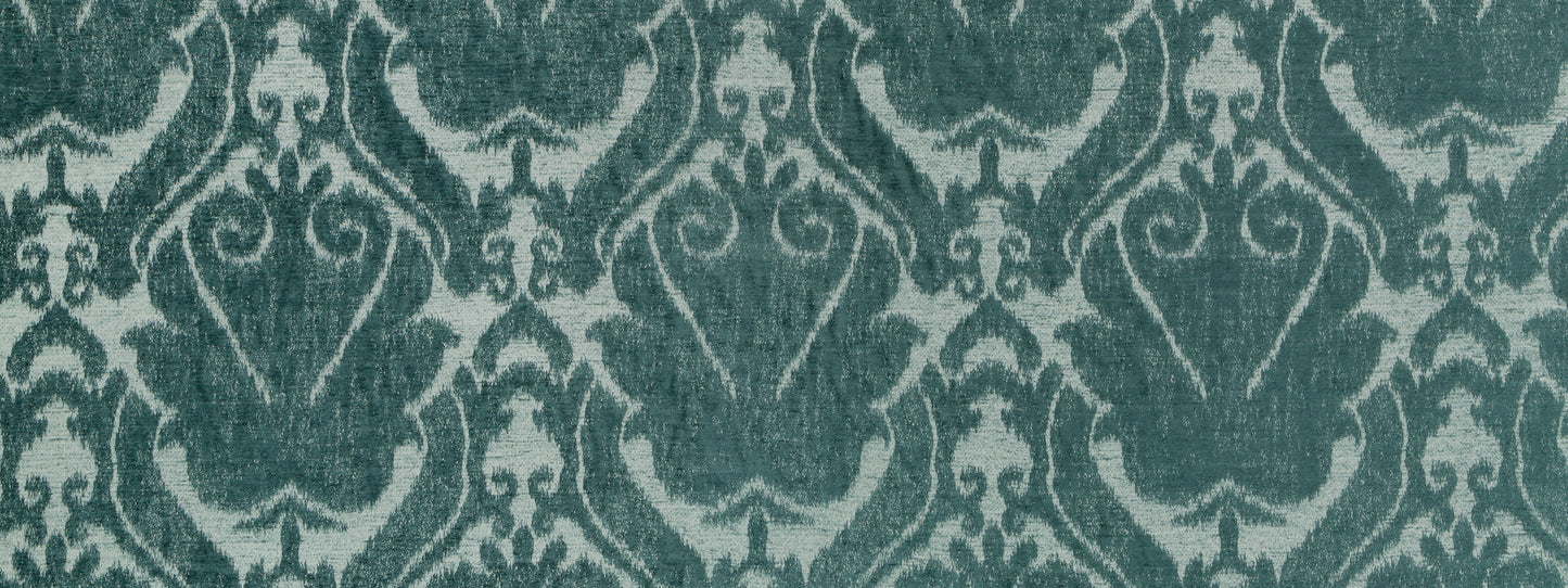 Teal damask patterned upholstery fabric with ornate scroll motifs.