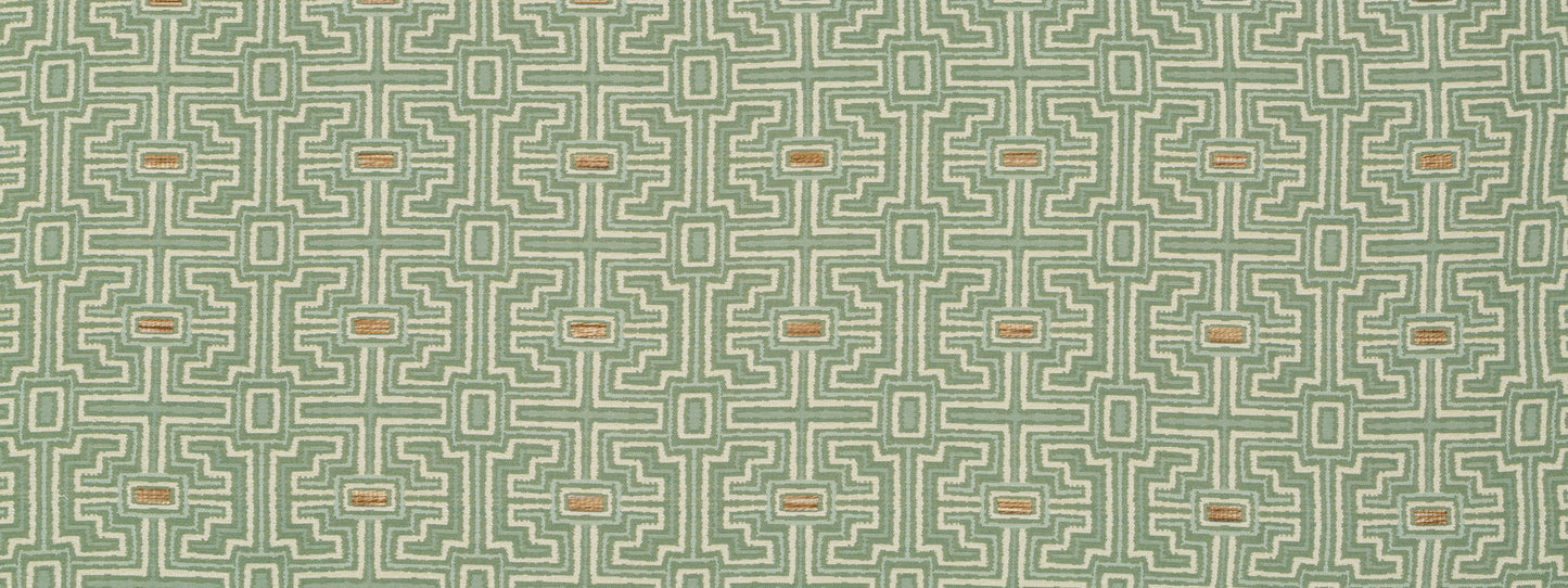 Green upholstery fabric featuring a beige Greek-key geometric pattern in a repeating tile design.