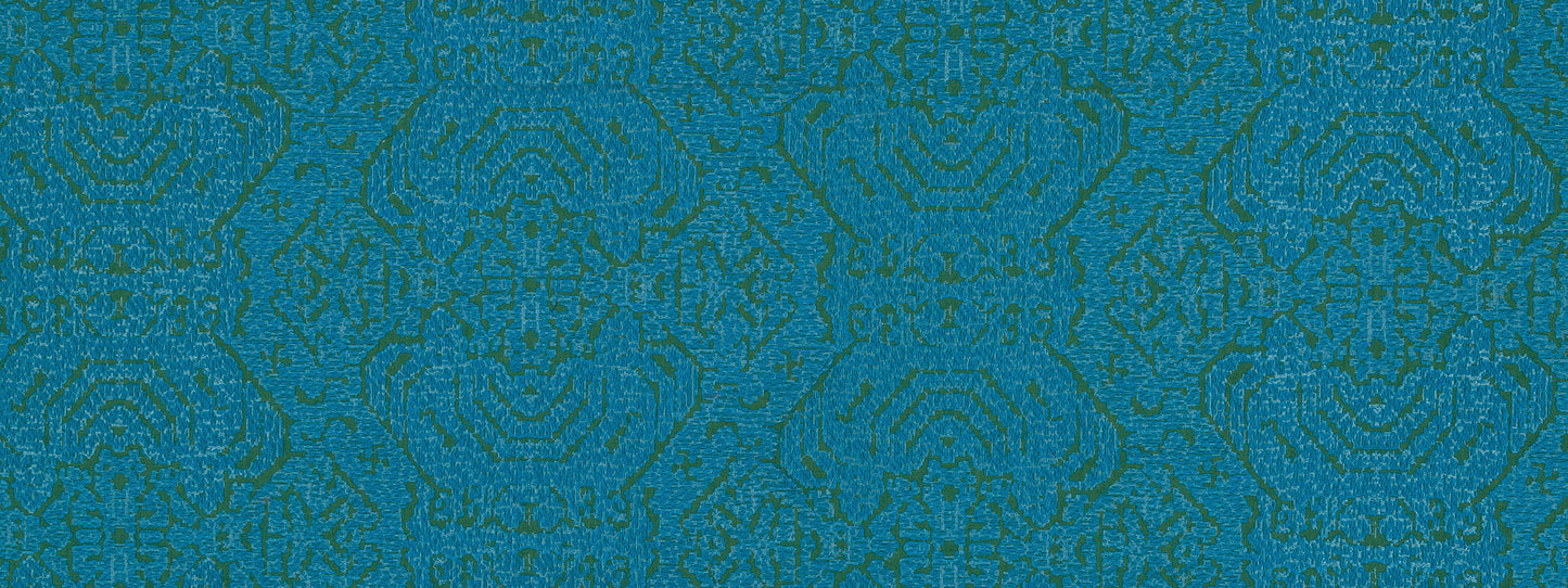 Teal-blue patterned textile with ornate repeating geometric damask motif.