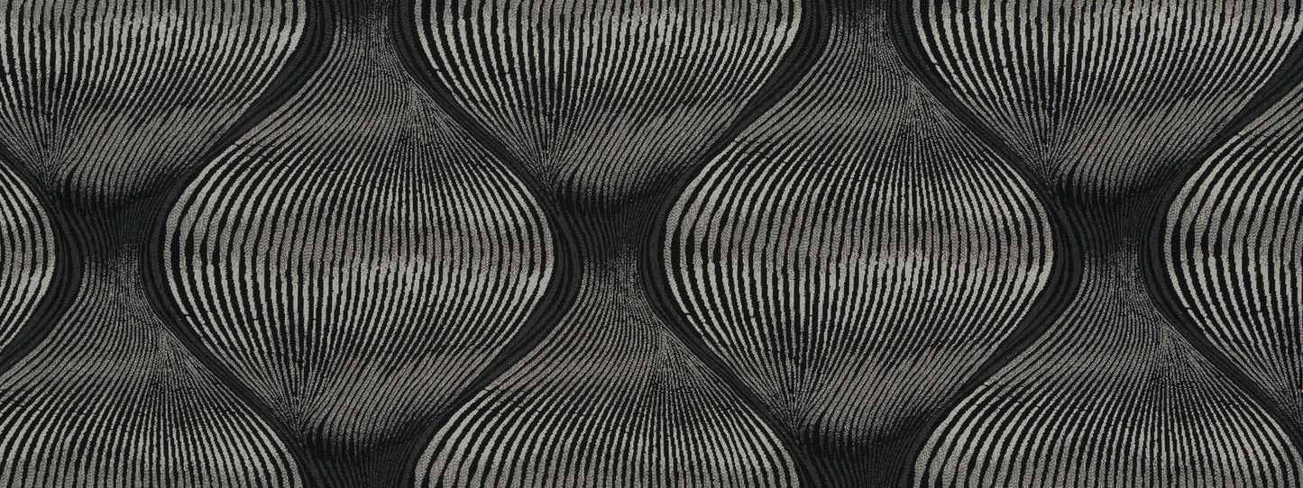 Close-up of a black geometric woven fabric with curved, ribbed lines forming diamond shapes.