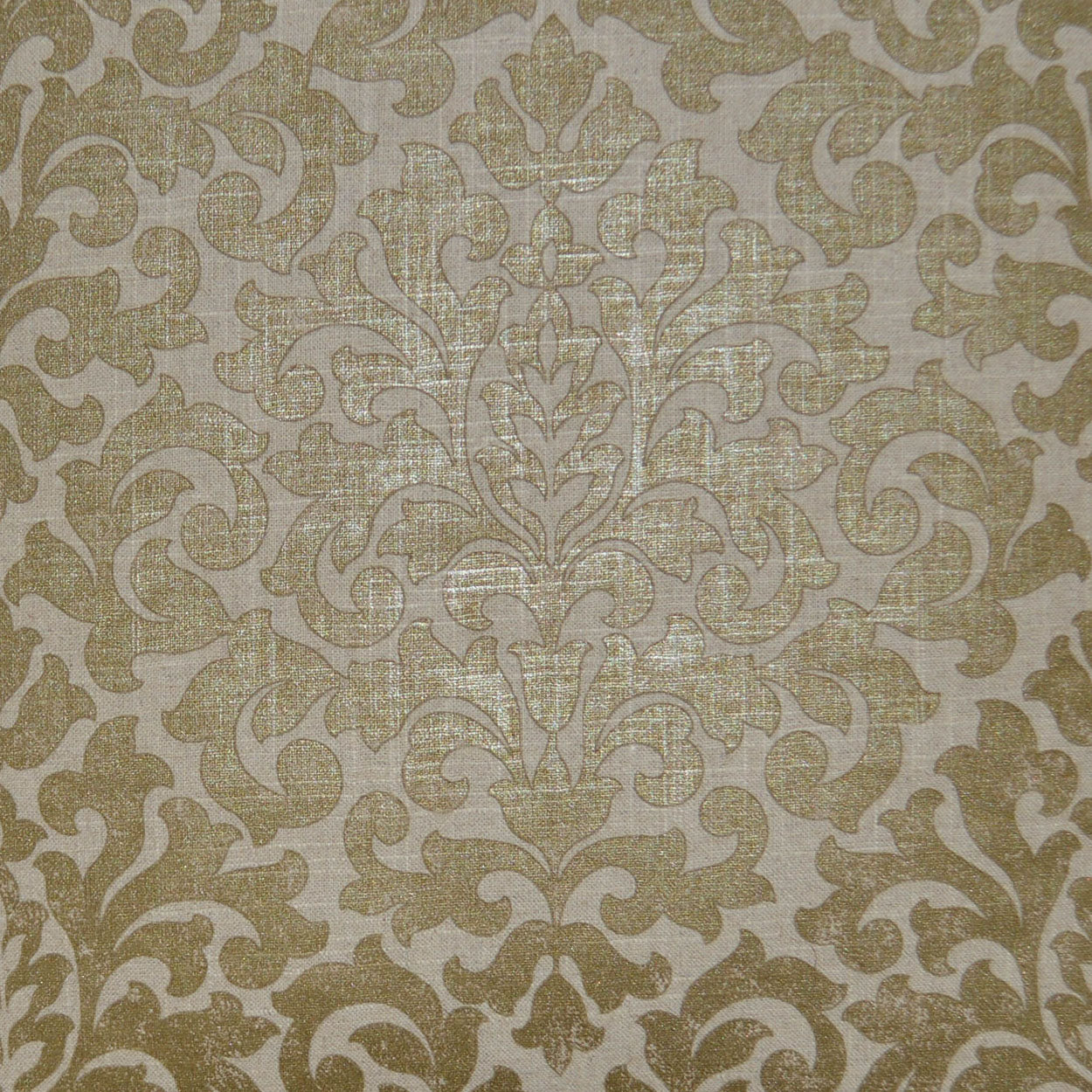 Beige damask fabric with gold ornate floral scroll pattern.