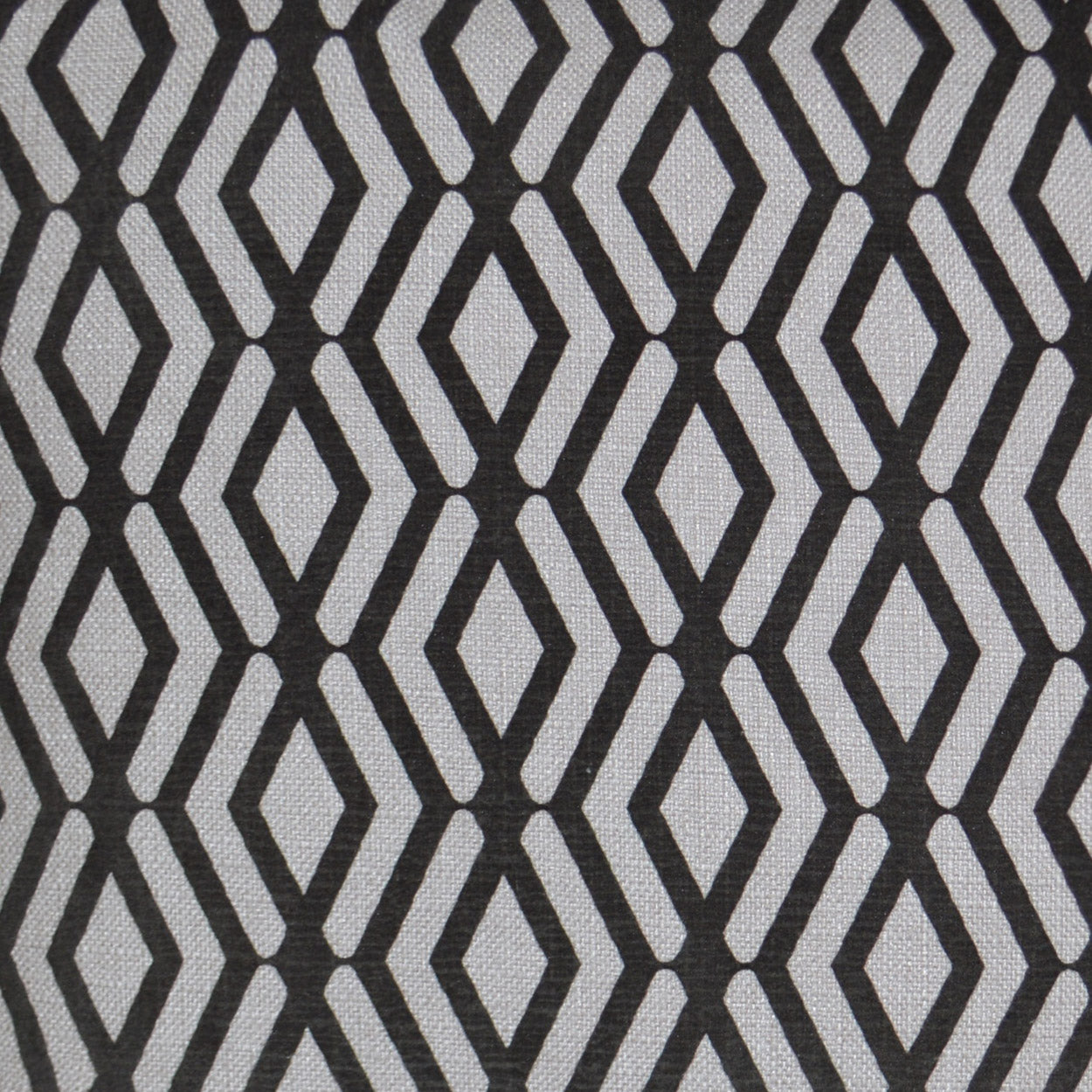 Gray fabric with bold black diamond lattice pattern, geometric textile suitable for upholstery or drapery.